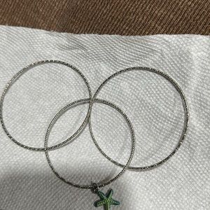 Bundle three sliver bracket with pendant bangles